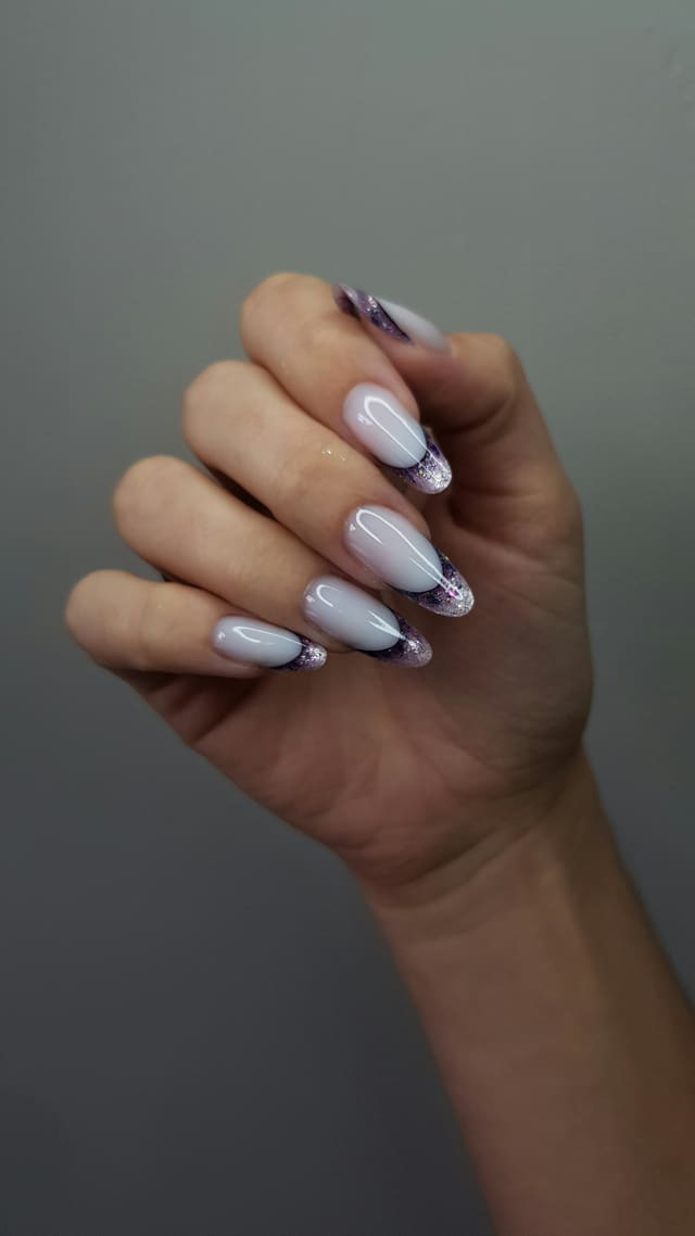 Long almond nails, milky white with purple marble tips